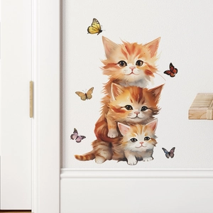 Detail showing colorful cartoon cats and butterflies on self-adhesive wall stickers