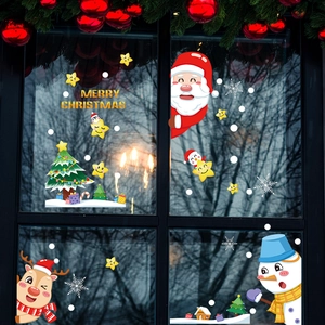 Stickers de Noël pour fenêtres avec Père Noël et renne sur une surface vitrée