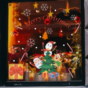 Detail of Merry Christmas static window stickers with Santa, snowman and snowflake motifs
