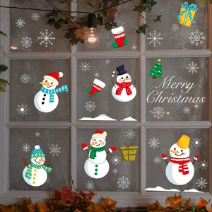 Festive Merry Christmas window decals with cartoon snowmen, snowflakes, and green trees