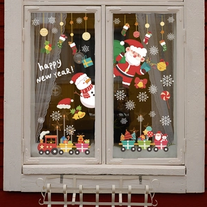 Christmas window decals with Santa Snowman and Happy New Year text for holiday decor