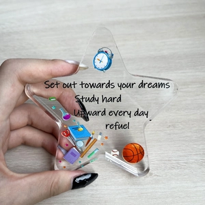 Star-shaped acrylic inspirational desk ornament with motivational quotes and colorful icons