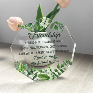 Transparent acrylic friendship souvenir with green leaves and white flowers decor