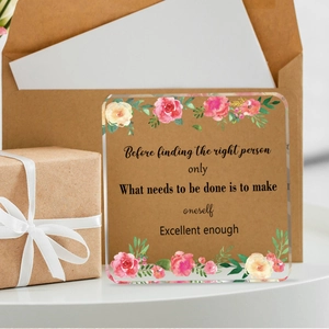 Square acrylic plaque with floral pattern and motivational quote in a gift setting