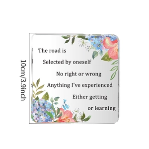 Macro shot of square acrylic ornament featuring watercolor florals and 10cm size marking