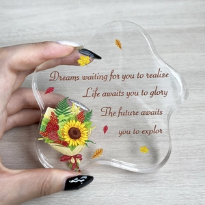 Close-up of cloud-shaped acrylic desktop plaque with sunflower and maple leaf print