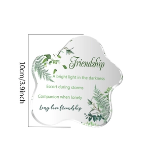 Detail view of a cloud-shaped acrylic friendship gift with leaf prints and dimensions