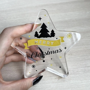 Transparent acrylic star Christmas ornament with gold Merry Christmas print and trees