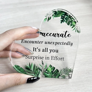 Clear heart shaped acrylic desktop ornament with tropical leaves and inspirational text