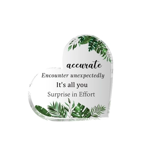 Transparent acrylic heart ornament with tropical leaf prints and inspiring quotes