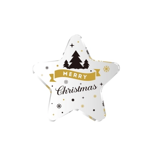 Star-shaped acrylic Christmas ornament with gold ribbons and forest silhouette print
