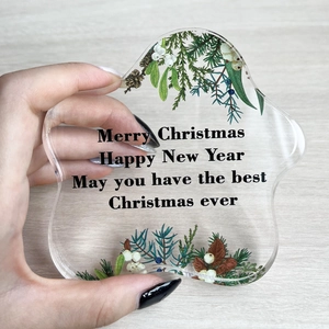 Irregular acrylic Christmas ornament with holiday botanical prints and Merry Christmas text