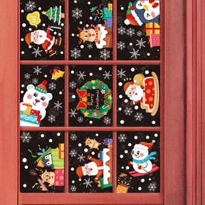Macro detail of Christmas window stickers with Santa, reindeer and snowman festive patterns