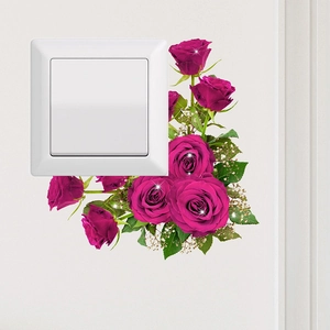 Detail of floral wall sticker with pink roses and stars around a white light switch