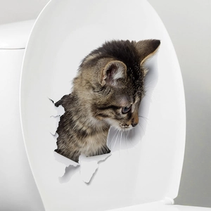 3D realistic tabby kitten sticker with broken wall effect on a white toilet lid