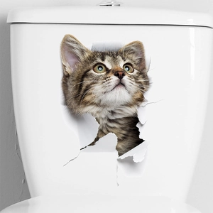 Detailed view of 3D tabby cat sticker with realistic broken wall effect on toilet tank