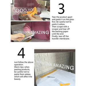 Detail showing the installation of You Look Amazing mirror decals with a yellow scraper tool