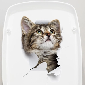 Detail of 3D cat wall sticker showing a cute kitten peeking from a white surface