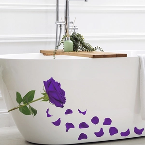 Detail of purple rose and scattered petals self-adhesive wall stickers on a bathtub