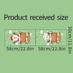 Macro view of Christmas wall stickers featuring Santa and penguin with 58x30cm dimensions