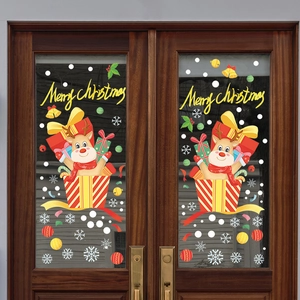 Christmas reindeer window stickers with Merry Christmas text on glass door background