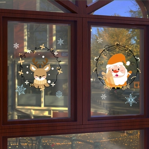 Cartoon Santa Claus and reindeer window stickers for festive home glass decoration