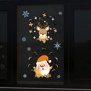 Christmas window stickers featuring Santa Claus and reindeer with snowflakes on glass pane