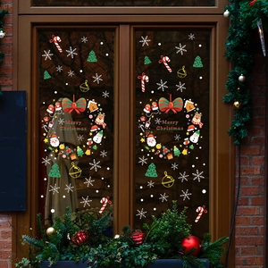 Christmas window decals set featuring Merry Christmas wreath, Santa, deer and snowflakes