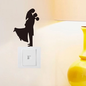 Autocollant mural silhouette romantique d'un couple pour décoration d'interrupteur