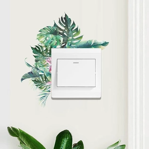 Autocollant mural pour interrupteur avec feuilles tropicales vertes et monstera