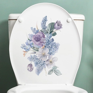 Floral toilet seat decal with purple roses and tulips in a minimalist bathroom setting