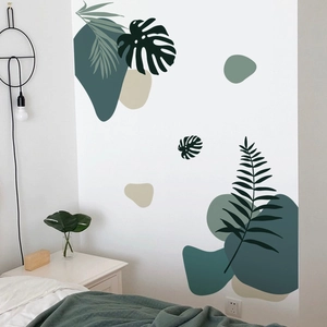 Minimalist tropical leaf wall decals with Nordic green plants and geometric shapes