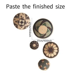Detail of 5-piece handmade woven seagrass wall hanging plates with 27cm size markings