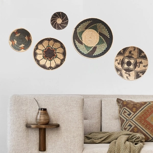 Five-piece bohemian woven seagrass wall basket set in natural tones for home decor