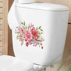 Floral bathroom wall stickers with pink flowers and green leaves on white toilet surface