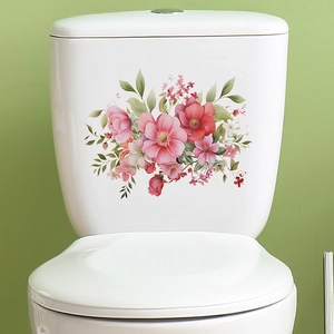 Floral watercolor toilet tank stickers with pink flowers and green leaves on white ceramic
