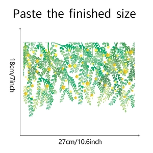 Détail montrant les dimensions du sticker mural plantes vertes et fleurs jaunes 27x18cm
