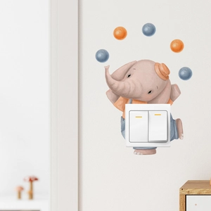 Sticker mural éléphant de dessin animé avec balles pour décorer l'interrupteur mural