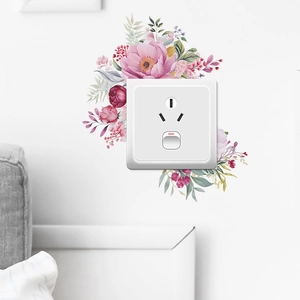 Stickers muraux floraux tropicaux peints à la main décorant un interrupteur blanc