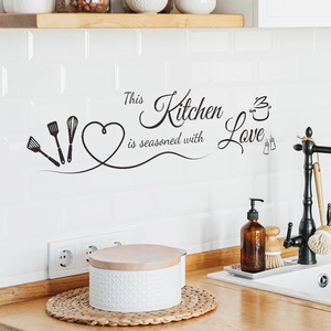 Kitchen wall sticker with slogan This Kitchen is Seasoned with Love on white tile background