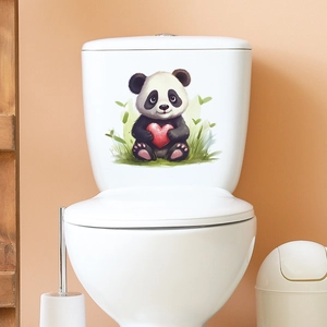Close-up of cute panda with heart sticker applied on a white toilet tank for bathroom decor