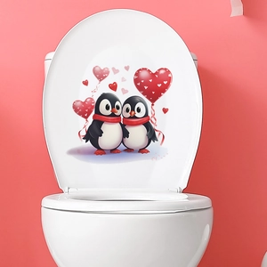 Close-up of cartoon penguin toilet seat stickers with red heart balloons on pink background