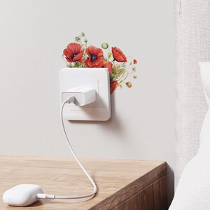 Elegant red poppy flower wall decal surrounding a light switch in a minimalist bedroom decor