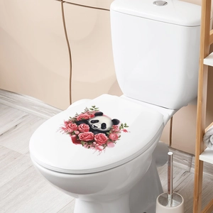 Vue détaillée d'un autocollant de toilette panda et roses roses dans une salle de bain