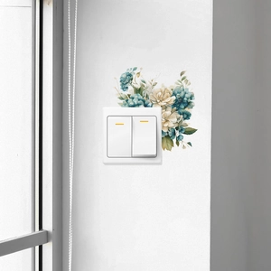 Self-adhesive floral switch wall sticker featuring blue and beige flowers on a white wall