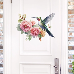 Wandsticker mit rosa Rosen und buntem Kolibri auf einer weißen Holztür für Deko