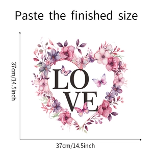 Detail view of heart-shaped floral wall sticker with LOVE text and size dimensions