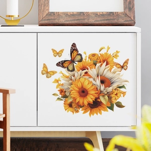Detailed close-up of colorful sunflower and butterfly wall stickers on a modern cabinet