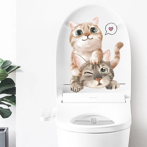 Cute cartoon cats toilet seat sticker featuring orange and grey kittens for bathroom decor