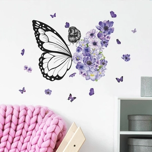 Wandtattoo mit Mädchenmotiv, violetten Blumenflügeln und schwarzen Schmetterlingen im Design